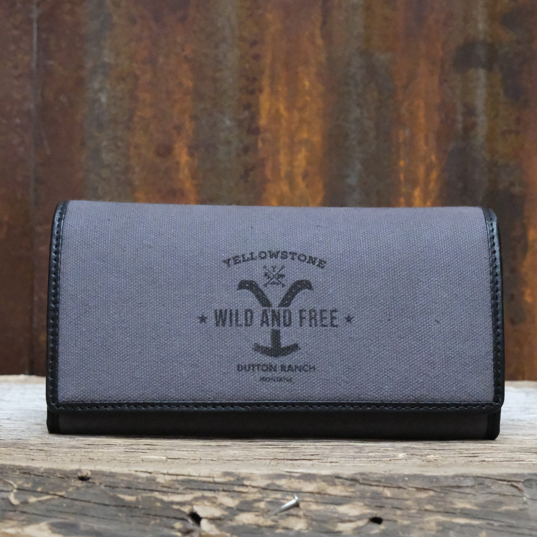 Myra Yellowstone Roverra Ash canvas sling wallet in black with leather trim and zipper closure