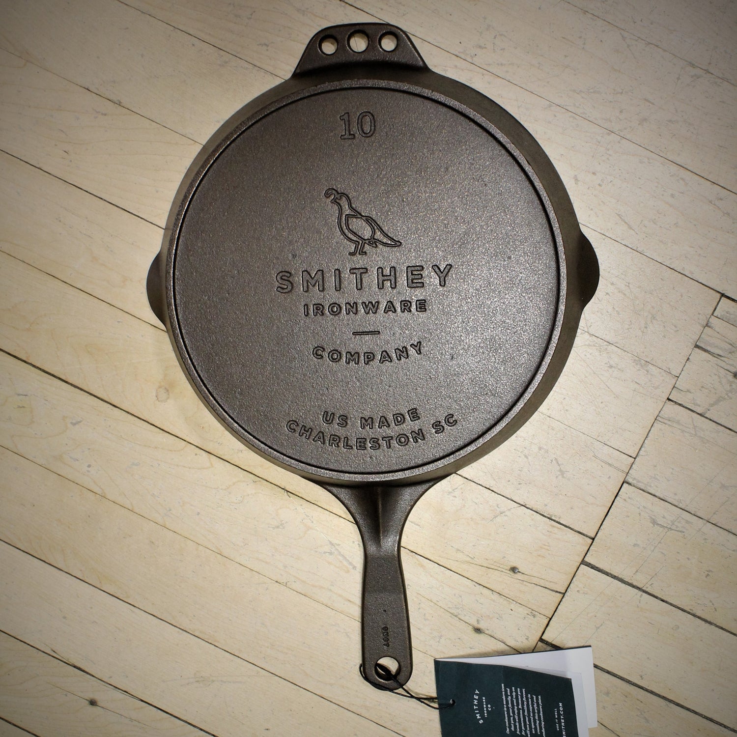 View of Smithey Ironware No. 10 Cast Iron Skillet with polished interior and ergonomic handle