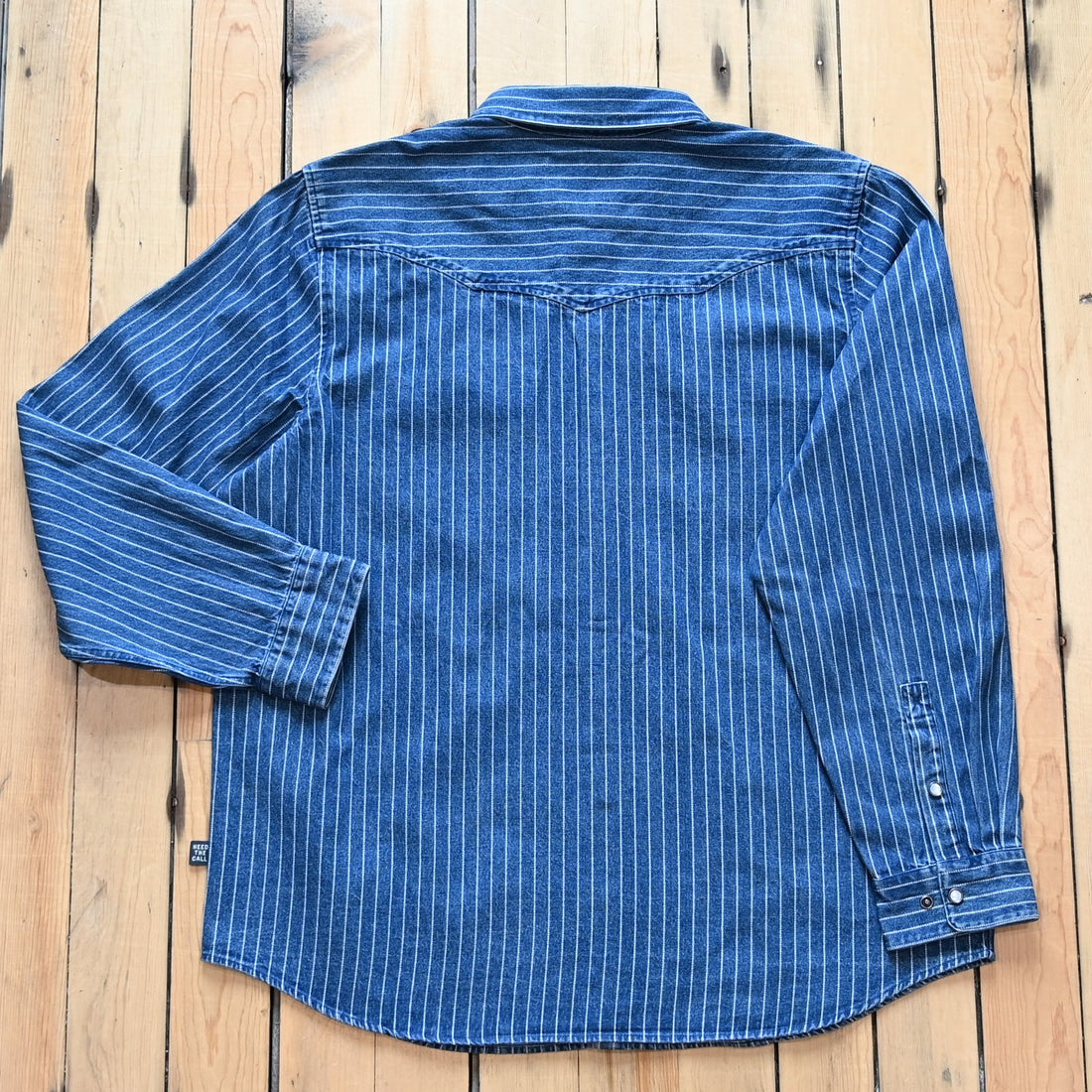 Howler Bros Dust Up Denim Snapshirt in Merle Stripe with pearl snaps and Western detailing