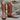 View of Hondo 13" cowboy boot in brown vintage goat with orange inlays and snip toe