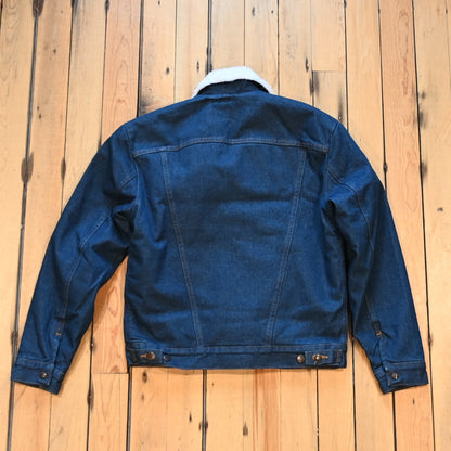 Men’s dark blue Wrangler Western sherpa-lined denim jacket with snap-flap pockets and spread collar