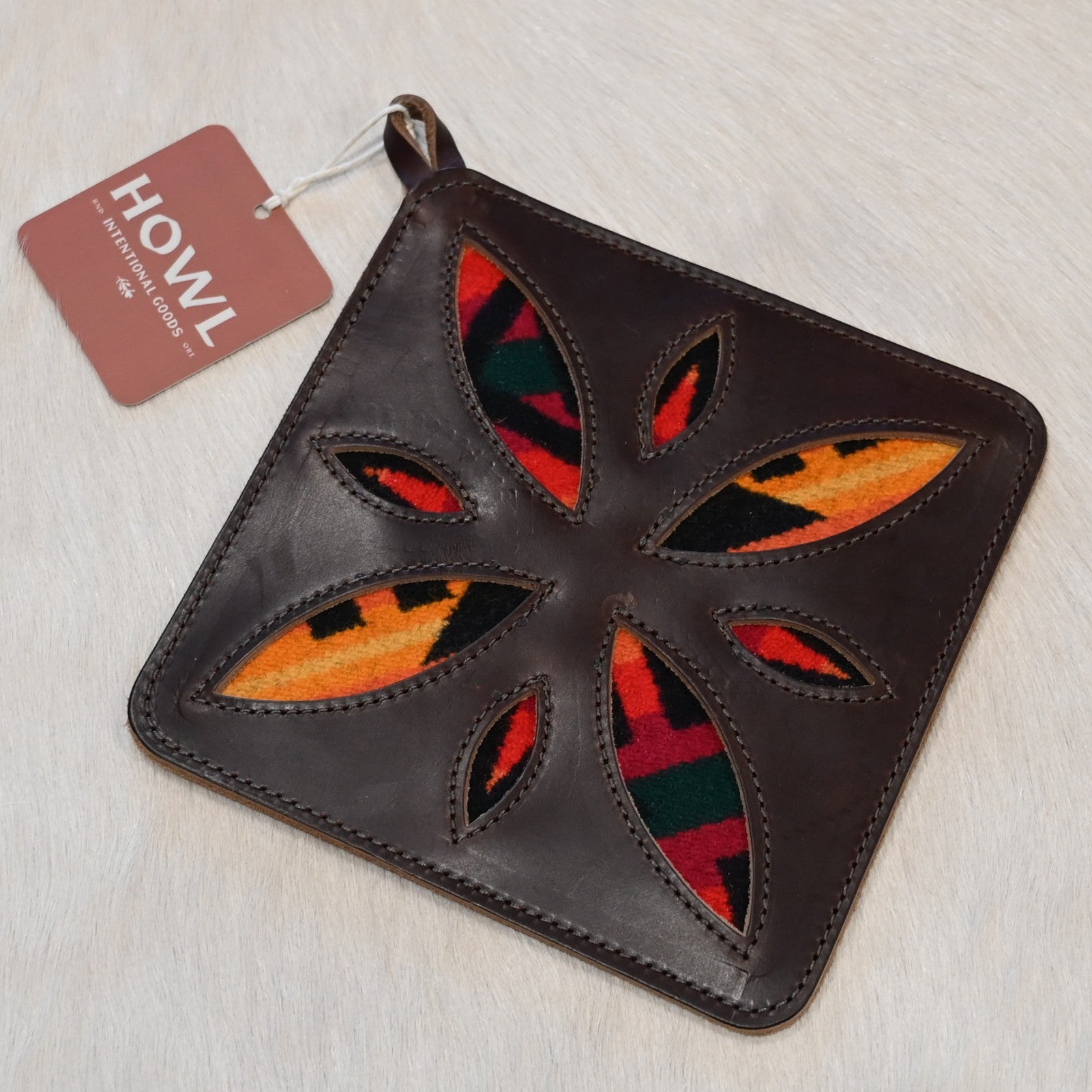 Howl Intentional Goods PanHandler trivet in chestnut leather with Pendleton wool inlay