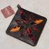 Howl Intentional Goods PanHandler trivet in chestnut leather with Pendleton wool inlay