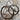 Tom Balding Ballhinge Ring Snaffle with sweet iron mouthpiece, copper inlays, and brown dot-finished ring.