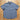 Howler Brothers Broncbuster snapshirt in Indigo featuring contrast piping and pearl snaps.