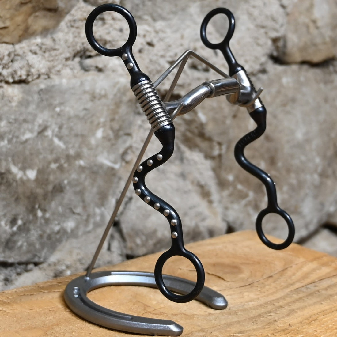 Myler black steel seven shank bit with sweet iron forward-tilt low port MB 36