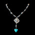Peyote Bird Revival Heartwell Concho Y Necklace with silver beads and a turquoise heart.