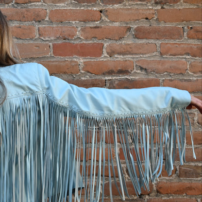 View of Double D Ranch Sonora Fringe Jacket – Celestial Sky sheepskin jacket with tonal fringe detailing and a slim, straight fit