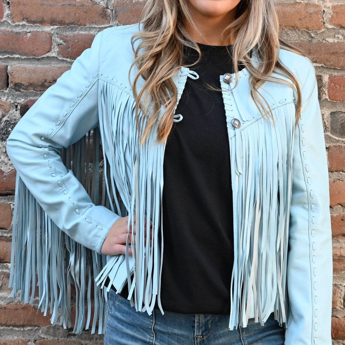 View of Double D Ranch Sonora Fringe Jacket – Celestial Sky sheepskin jacket with tonal fringe detailing and a slim, straight fit