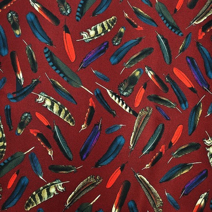 Cowboy Images feathers on maroon wild rag 36x36