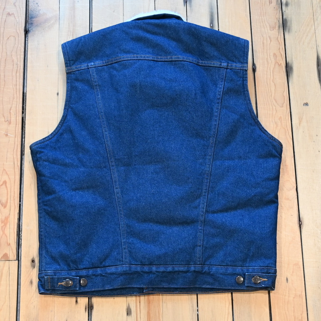 View of Wrangler Sherpa Lined Denim Vest in Prewashed featuring sherpa lining, spread collar, and button-front closure