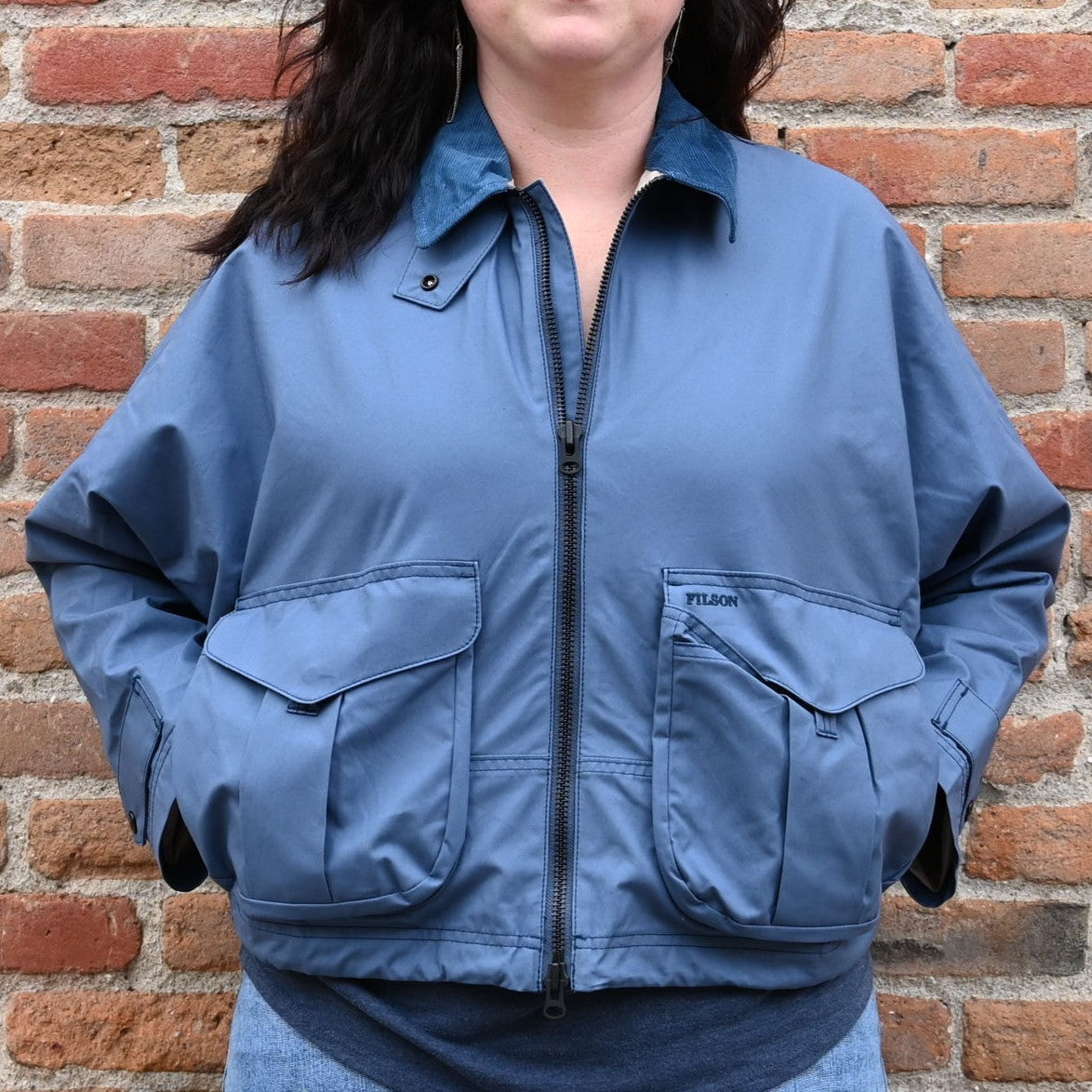 View of Filson Ladies Aviator Cloth Short Work Jacket in Flag Blue featuring gusseted cargo pockets and corduroy-lined collar