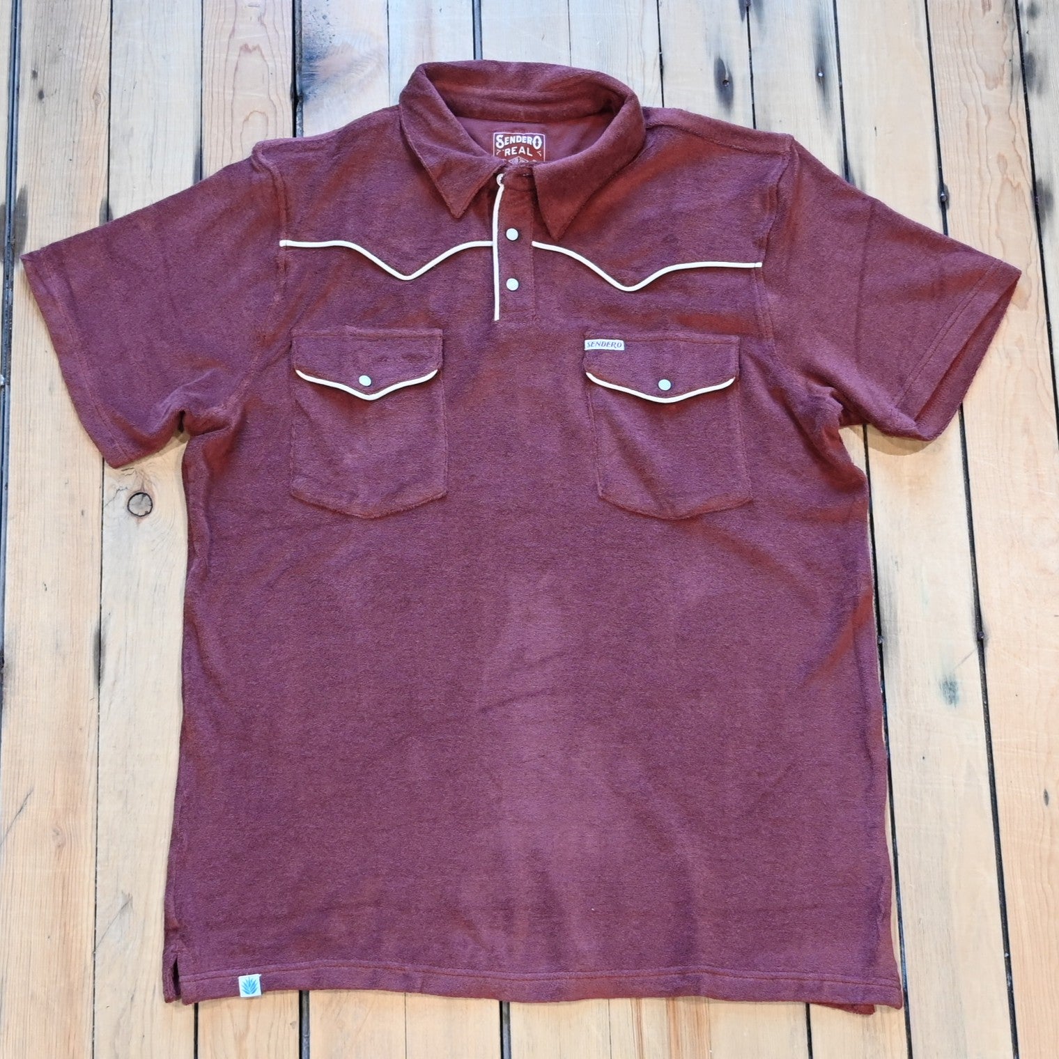 Mahogany Sendero Cantina Terry Polo with Western yokes, chest pockets, and pearl snap closure