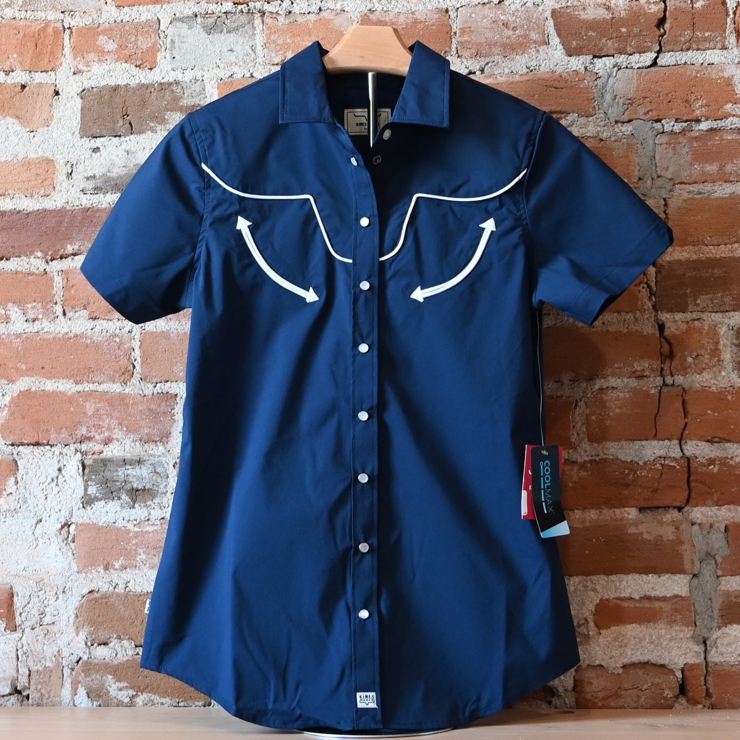 View of Kimes Ranch Long Horn Top in Navy, featuring a short-sleeve design, vintage arrow accents, and a subtle longhorn logo