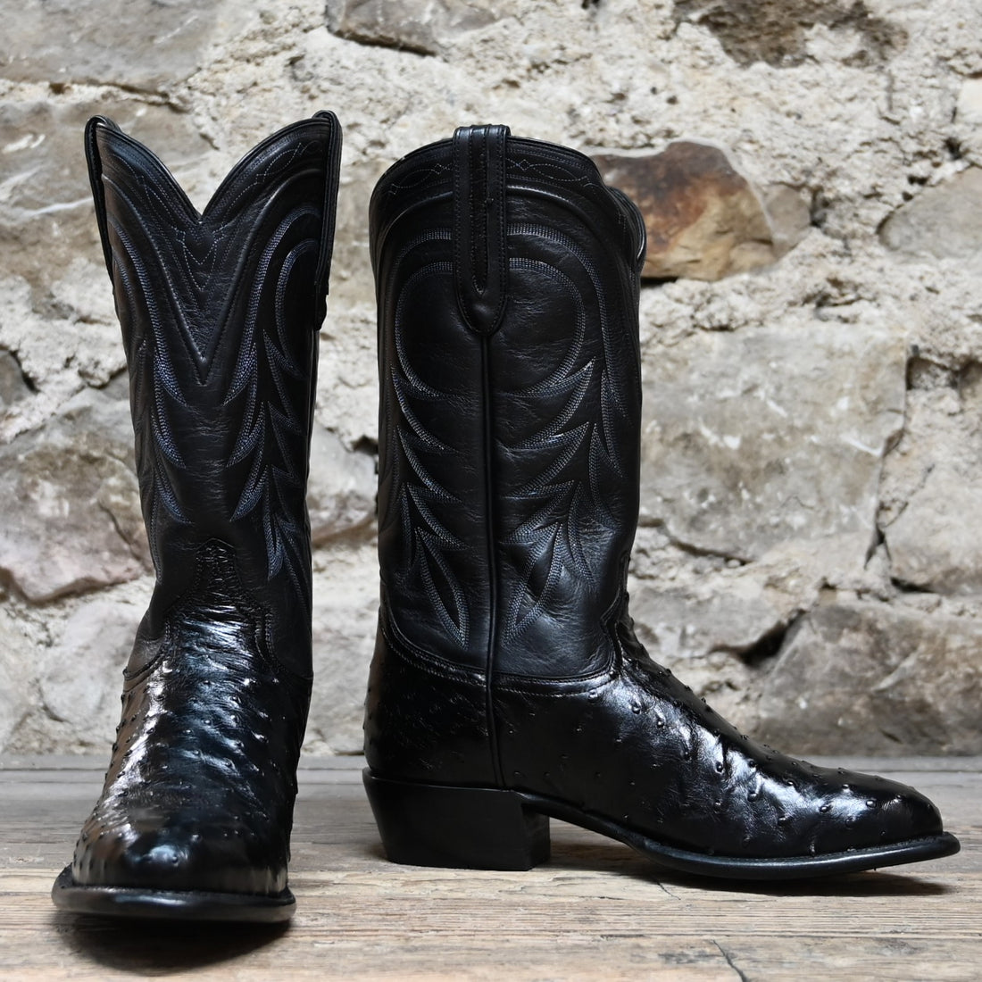 View of Hyer HAVEN 13" boots showcasing black full-quill ostrich leather vamp and black Ranch Hand cowhide top with round toe and underslung heel