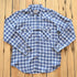 View of Blue Blanket men’s blue plaid linen Western shirt with pearl snaps and yoke detail
