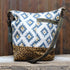 Myra Blue Sapphire printed canvas shoulder bag with leather trim and zipper closure