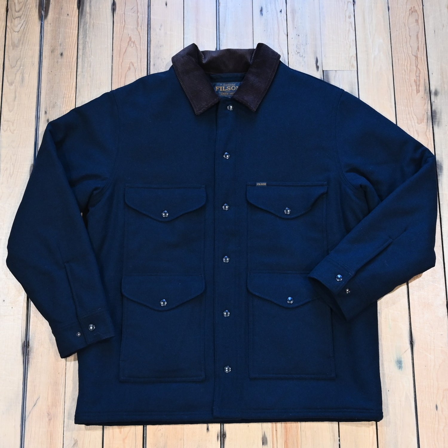 Filson Spokane Insulated Cruiser Jacket in navy wool-blend with snap front and cargo pockets