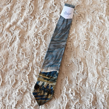 View of Rockmount “Cattleman Conference” silk tie featuring cowboy scene by Howard Post