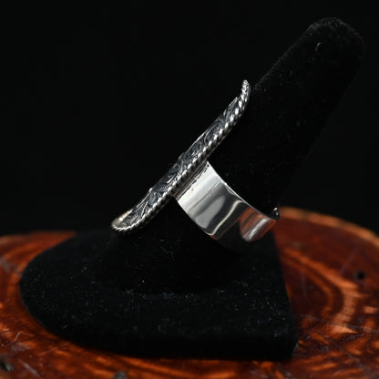 Vogt Abigail sterling silver adjustable ring with engraved design and rope-edge border