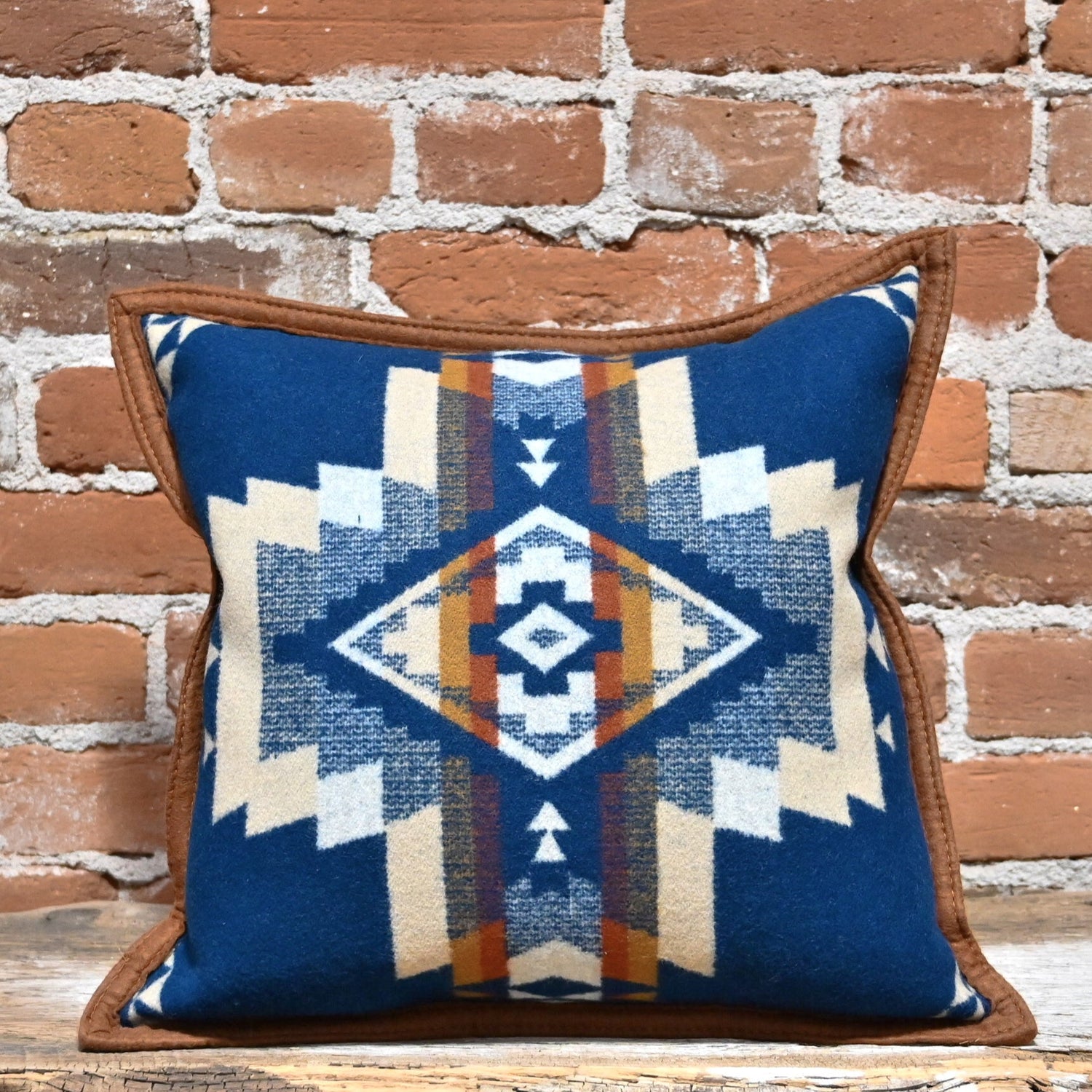 View of Pendleton Rock Point pillow in blue geometric wool blend with feather fill