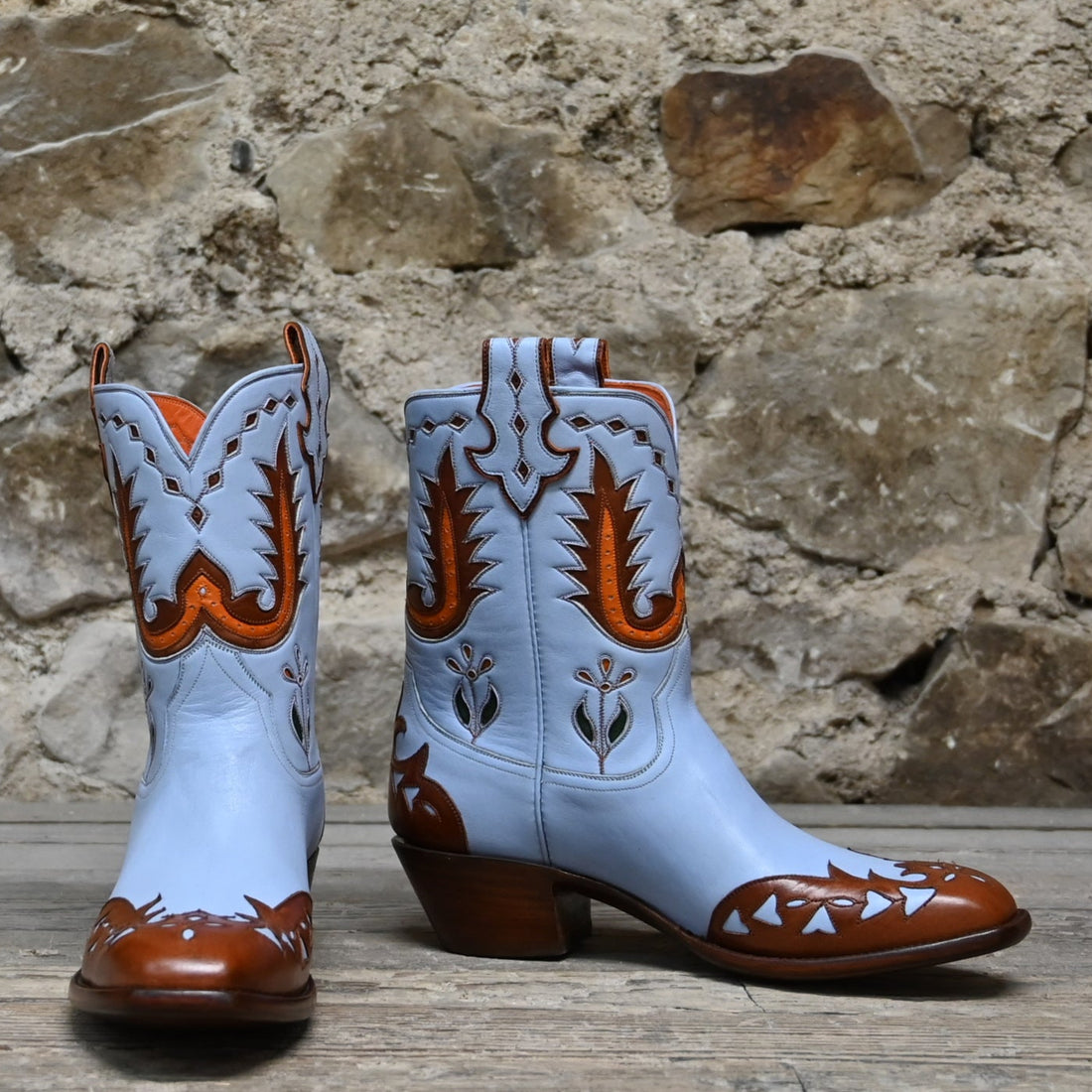 View of Stallion Ladies 9" Peewee boot in powder blue calf with vintage wingtip and combo heel