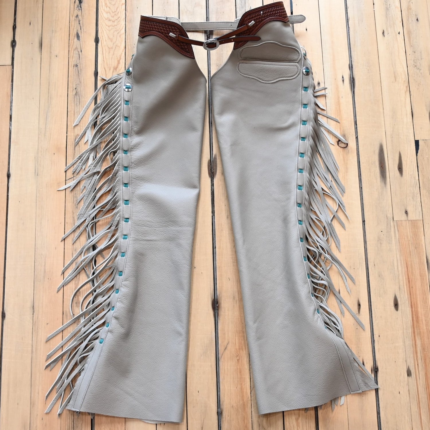 View of K Bar J Borderline Versatility Chap in Medium with fringe and leather border