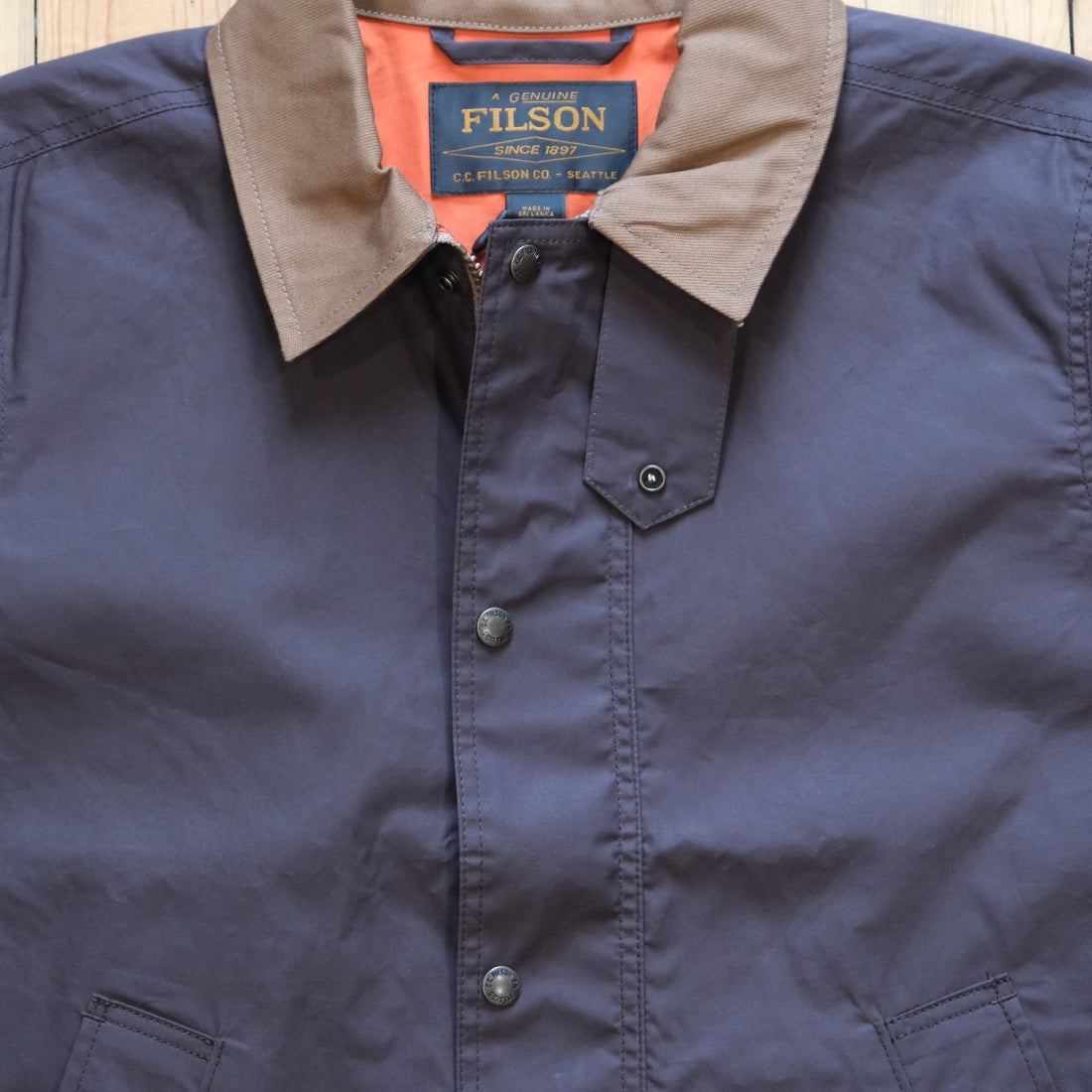 Filson Dry Wax Short Field Jacket in Dark Brown.