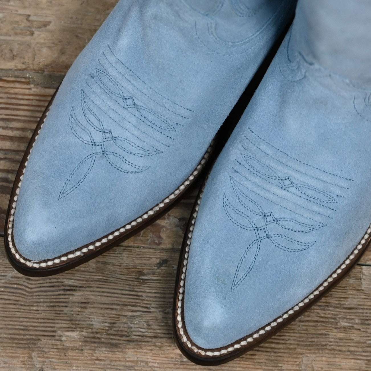 View of Macie Bean 15&quot; baby blue suede boot with almond toe and cowgirl heel