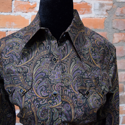 View of Rockmount women’s paisley cotton Western shirt with sawtooth pockets and diamond snap closures