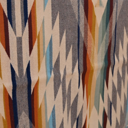 View of Pendleton Summerland Queen blanket in Taupe Multi with reversible jacquard design