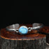 View of Sunwest Silver Paul Livingston Golden Hills One Stone Cuff featuring a light blue Golden Hills turquoise stone set in sterling silver