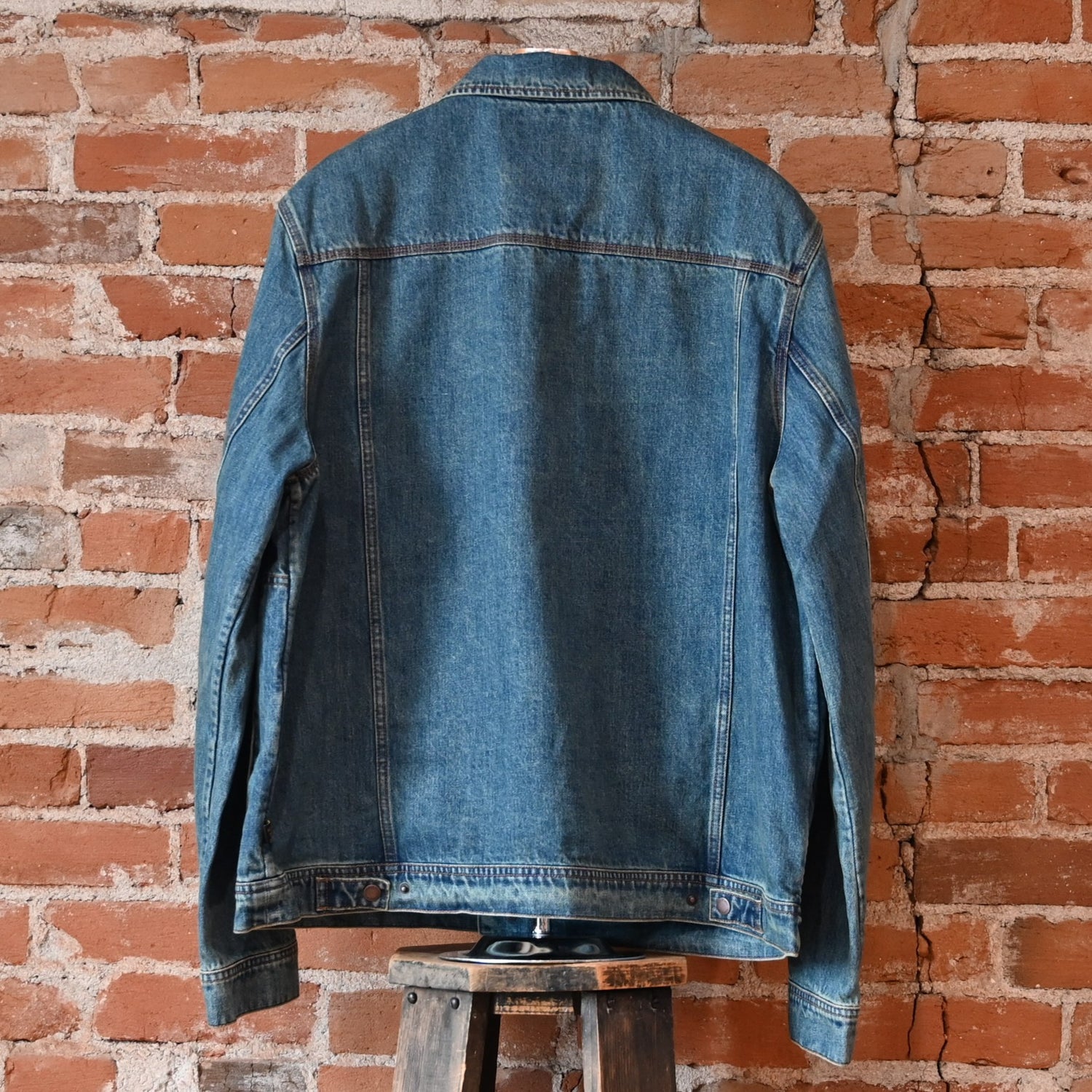 Howler Bros Denim Depot Jacket in Petty Mid Wash — front view, chest pocket, snap cuffs