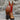 View of Hondo 16" cowboy boot with red top, honey crazy horse vamp, wide square toe, pull holes, and spur ledge