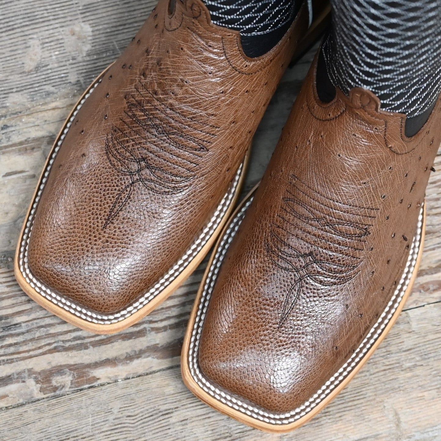 View of Horse Power Kango Boot with tobacco ostrich vamp, black shank, square toe, and pull straps