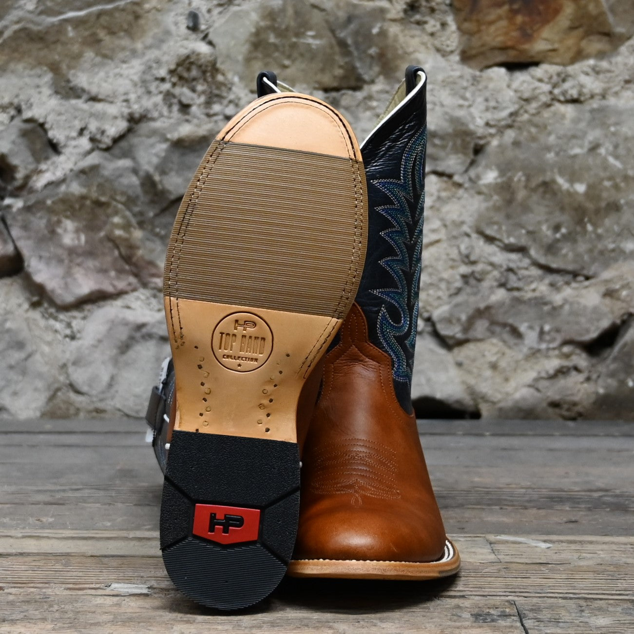 View of Horse Power 11&quot; boot with navy goat top, cognac Belton vamp, medium round toe, and pull straps