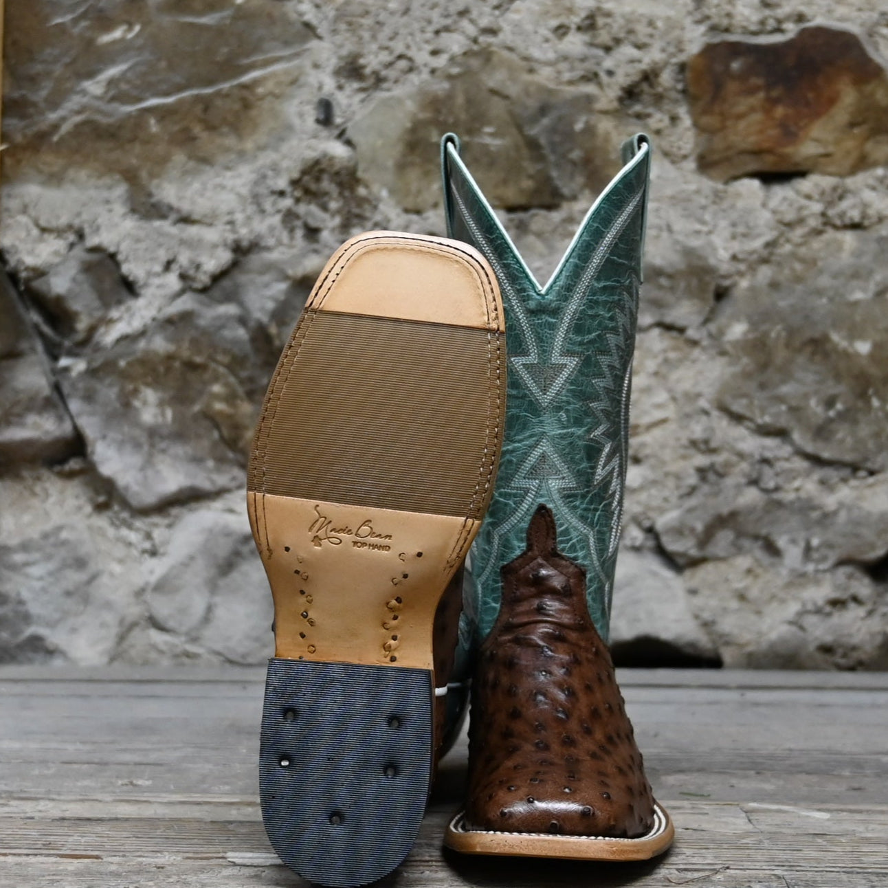 View of Macie Bean 12″ boot in sky blue shaft with Kango tobacco ostrich vamp, almond toe and cowgirl heel