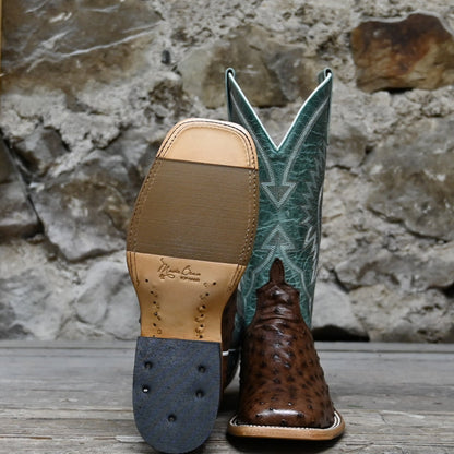 View of Macie Bean 12″ boot in sky blue shaft with Kango tobacco ostrich vamp, almond toe and cowgirl heel