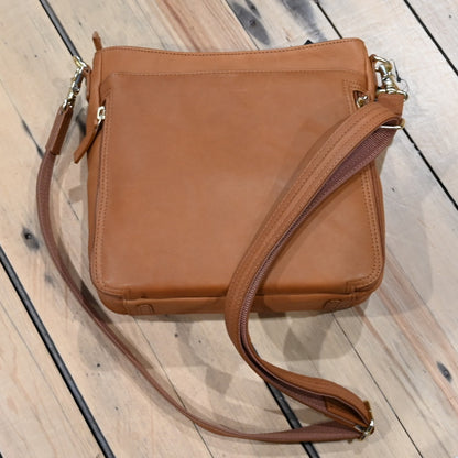 Gun Toten Mamas tan brushed cowhide cross-body conceal carry bag