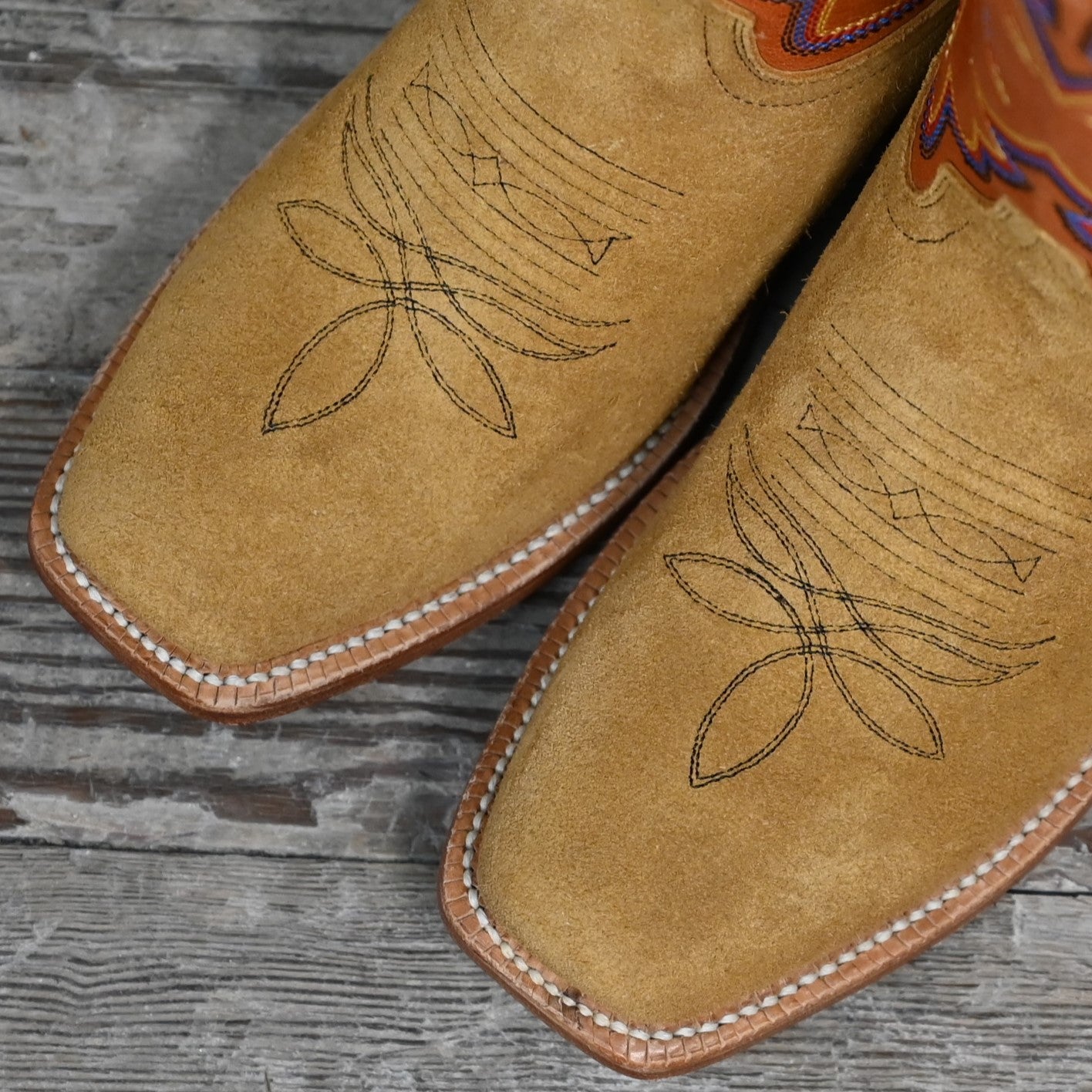 View of Hyer ROSE HILL 13&quot; boots showcasing tangerine vintage goat top and bronze napped roughout cowhide vamp with Cutter toe and leather stacked heel