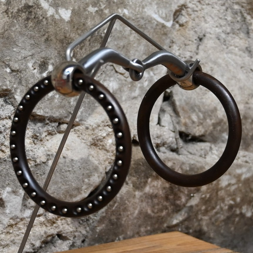 Tom Balding Divots &amp; Dots Loose Ring Snaffle with sweet iron mouth and brown engraved rings.