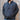 View of Filson Granite Spire Fleece Pullover in Black featuring Cordura® nylon-reinforced forearms and microfleece-lined handwarmer pockets