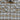 View of Plaid button-up shirt in tan, brown and grey by Pendleton Burnside style