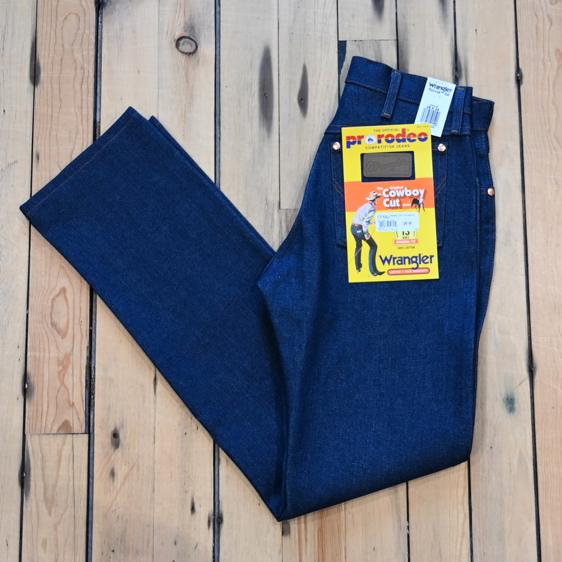 View of Wrangler Men’s Cowboy Cut Original Fit jeans in Prewashed Indigo with boot leg and five-pocket styling