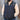 View of Filson Men's Ultralight Vest in Blue Coal, Black/Olive Gray, and Surplus Green/Gold Ochre, featuring a lightweight Cordura® ripstop nylon shell and PrimaLoft® Gold insulation
