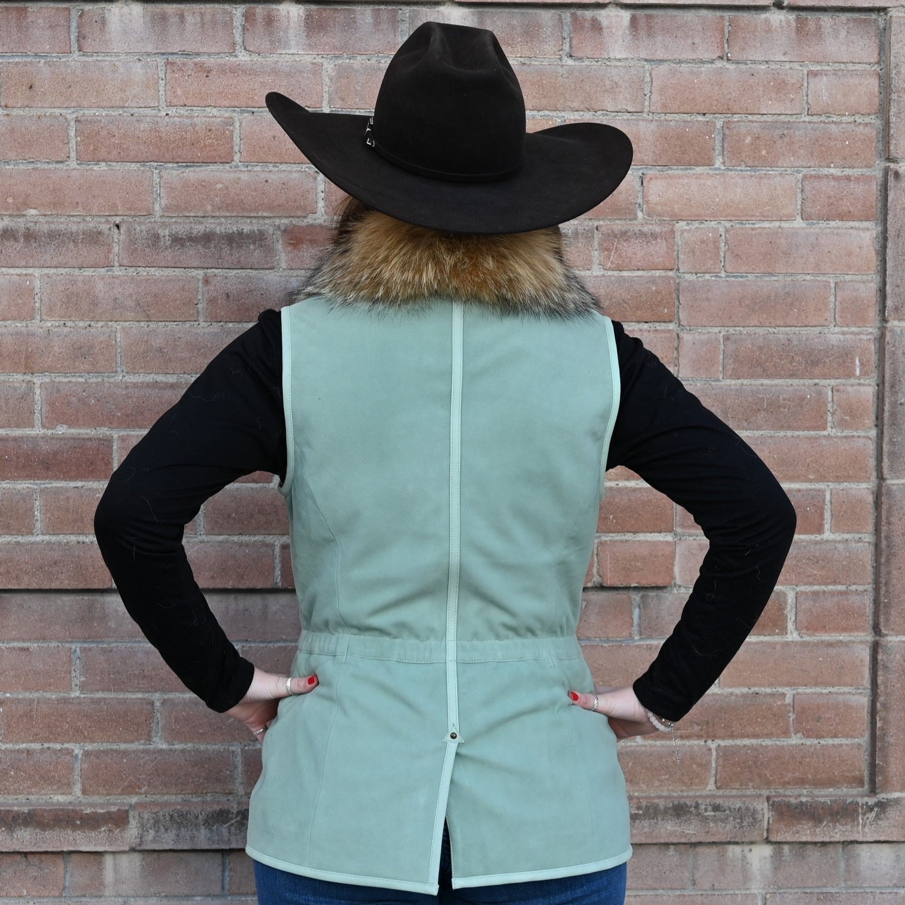 View of Double D Ranch Hondo Vest – Desert Yucca goat suede vest with faux fur trim and functional pockets for a Western-inspired design
