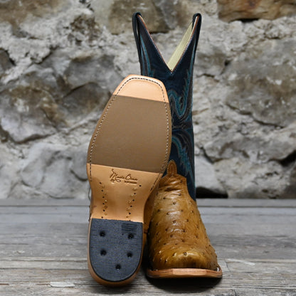 View of Macie Bean 12″ boot with antique saddle ostrich vamp and navy explosion top, TK toe and cowgirl heel
