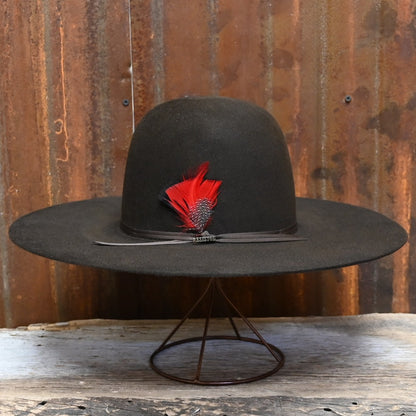 View of Side of Resistol Chute in Chocolate with Open Crown and Red Feather.