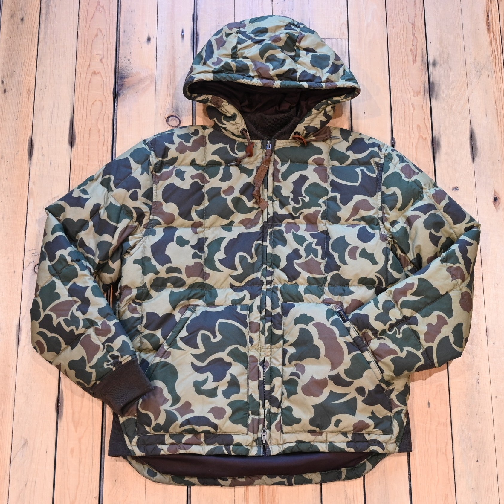 Filson Waxed Down Jacket in Tundra Shrub Camo with hood, waxed shell, and insulated down fill