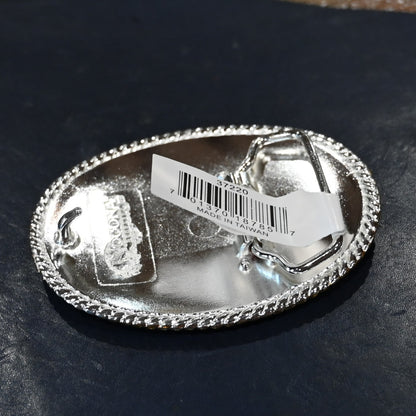 Nocona oval buckle with gold rope edge and engraved floral scroll design